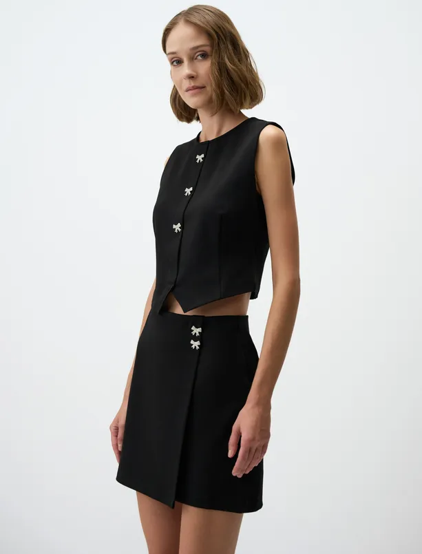 Women Black Knitted Mini Skirt with Elastic Waistband and Bow Detail