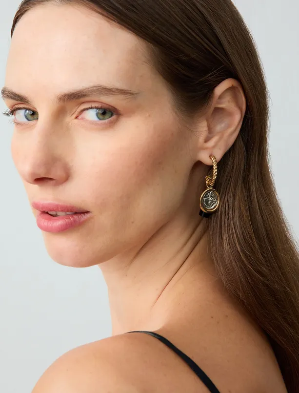 Women Yellow Dangling Earrings with Shiny Figure Detail