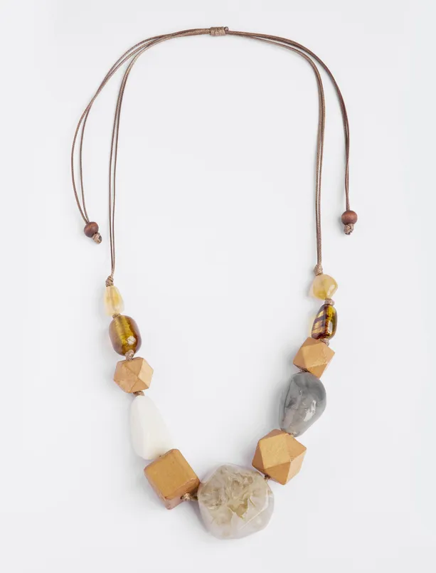 Women Orange Asymmetric Patterned Stone Necklace