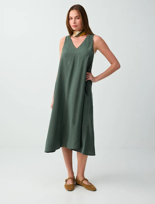 Bayan Haki V Yaka Rahat Kesim Kolsuz Dokuma Elbise