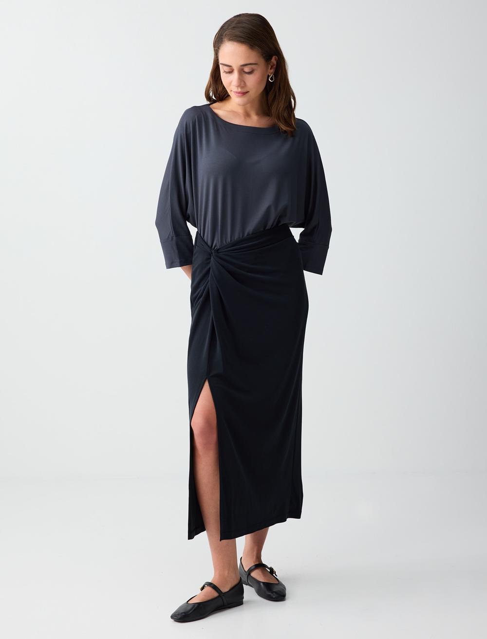 Normal Bel Yırtmaç Detaylı Modal Örme Midi Etek