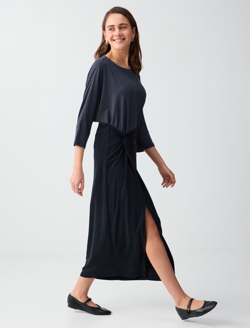 Siyah Normal Bel Yırtmaç Detaylı Modal Örme Midi Etek Kombini