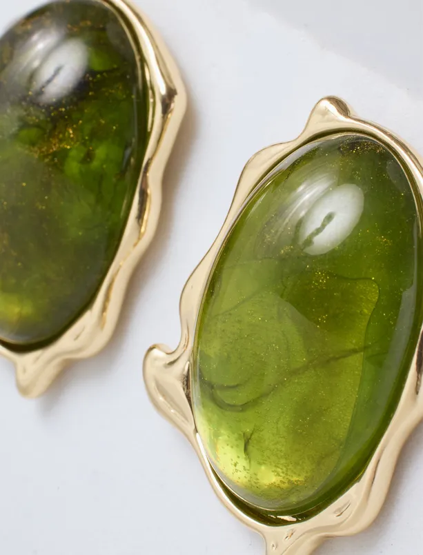 Women Green Modern Earrings with an Asymmetrical Design
